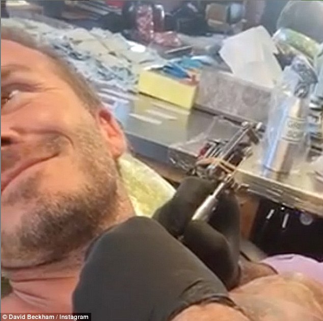 2ADDB3D400000578-3175412-Sitting_in_the_tattooist_s_chair_brave_David_had_a_big_smile_on_-m-5_1437948882451