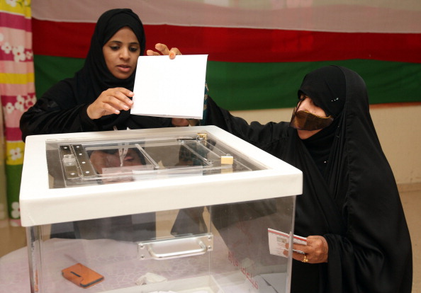 An Omani woman casts her vote at a polling station in the al-Khaburah district, on December 22, 2012. Omanis went to the polls for the Gulf sultanate's first ever local elections but the 192 elected councillors will have only advisory powers. AFP PHOTO / MOHAMMED MAHJOUB (Photo credit should read MOHAMMED MAHJOUB/AFP/Getty Images)